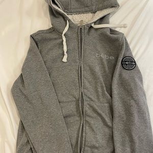 BEBE zip-up sweater
